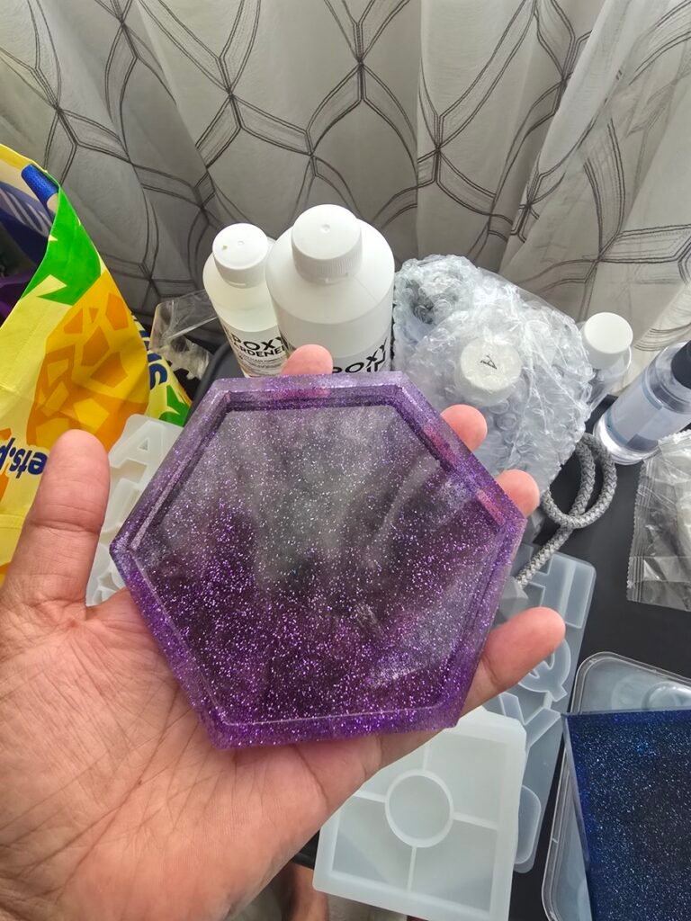 Handmade hexagon resin coaster with sparkling purple glitter