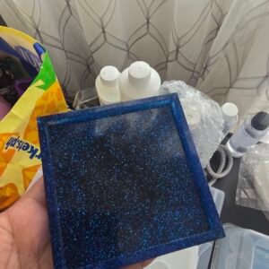 Handmade square resin coaster with sparkling blue galaxy glitter